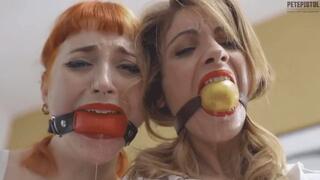 Secretaries Alba and Royal tightly ballgagged and bound, trying to escape