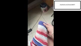 Sofii_hott itches feet out of fuzzy socks