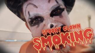 Spooky clown smoking