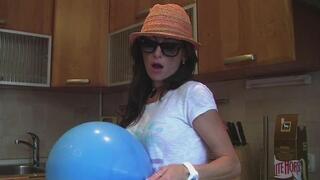 Inflating and nail popping by Mishel big blue balloon