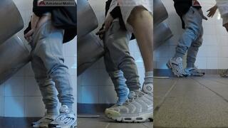 Amateur boys in sneakers wank and try handjob in public toilets' urinal