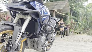 Princess Nicolle the sexy biker on punishment boots riding the Cyclone RX600