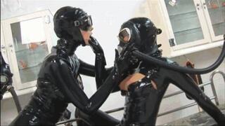 The black rubber gas mask fetish slut with her latex girlfriend - Pussy licking and fingering - Pissing on belly