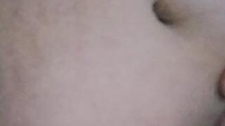 Playing with this racing wheel and poking my bely button