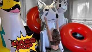 mass popping big inflatables