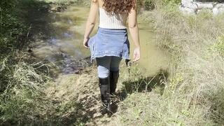 Luxury high heels boots in the mud