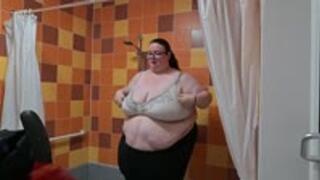 SSBBW GIANT SQUEEZES INTO SWIMWEAR WITH HELP FROM A FRIEND