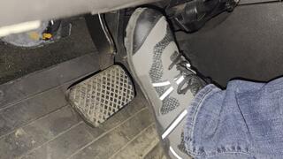 Driving in green barefoot sneaker