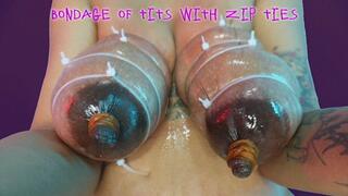 Bondage of tits with zip ties