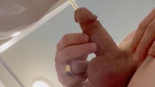 Amateur redhead guy pissing in public urinal filmed from below