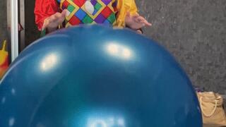 clown girl fun on hopperball and beachball