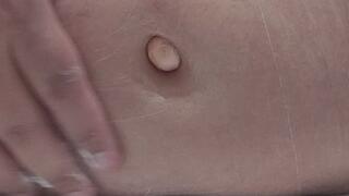 Candy ball in my belly button and lotion rub