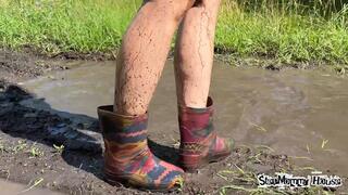 Color Wellies Stuck in Mud & Messy after Rain - Boots Full of Mud, Walking Outdoors off Road, Dirty Soles rubber Boots, Wet & Messy, Discarded shoes, Powerful Woman, Wrecked Shoes