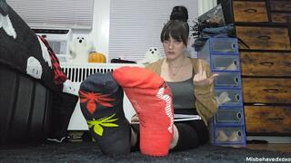 Ignoring you, flipping you off and telling you how pathetic you are while you stare at my socked feet.