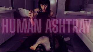 italian goddess smoking cigarette with human ashtry