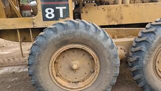 Katherine Struggling to drive a huge Caterpillar Machine