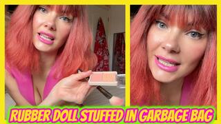 Rubber Doll Stuffed In Garbage Bag