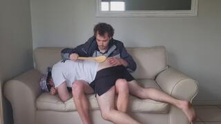 Spanking with a Thick Wooden Spoon Over the Knee from the Front