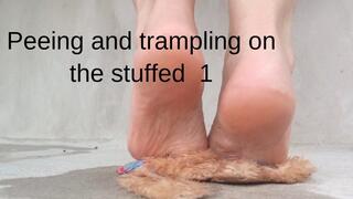 Peeing and trampling on the stuffed 1