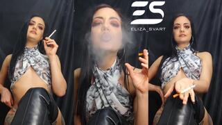 Smoking in a skull top and overknee boots