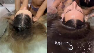 Parting the hair and dipping the head in the water (custom video)