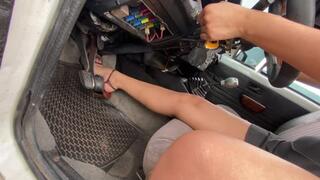 Ely's beautiful arched feet pump the pedal of the old chevette