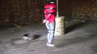 Gina bound and gagged hopping through the old warehouse WMV