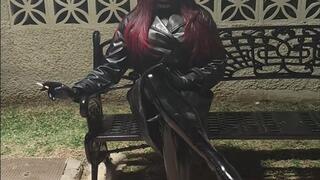 Gummed Tania walks smoking in the street