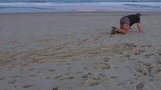 Little Sissy Bitch Plays Fetch on a Public Beach Like a Dog