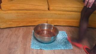 Fifi sinking red rubber flats into ankle deep melted gummies