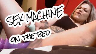 Sex Machine lying on the bed