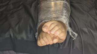 Part 2: Completely wrapped in cling film, unable to move.