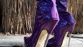 ANIA - Purple shiny patent leather boots in action