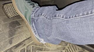 Green sneakers on the pedals!