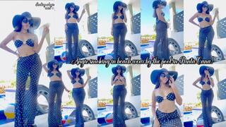 Angie smoking in beach wear by the pool in Punta Cana!