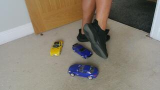 Requested clip Nikkichick crushes 3 exotic toy cars in Nike trainers Giantess toy cars crush right view