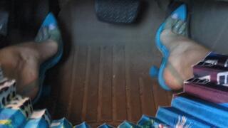 Fifi playing with the pedals then driving in clear blue high heels that see through to her silver toe rings