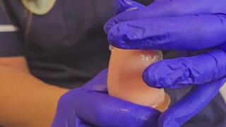 Condom application to my huge dildo