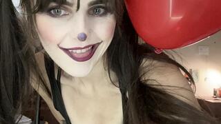 Empress Scarlett plays with a helium tank dressed as a sexy clown
