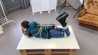 Rey Sanson bound and gagged in shiny nylon Down