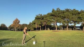 Pin-up popping huge iridescent bubbles blowing in the wind copy 109