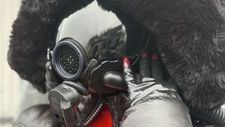 Rubbermissy is preparing for a heavy rubber foto shooting with big boobs and gas mask
