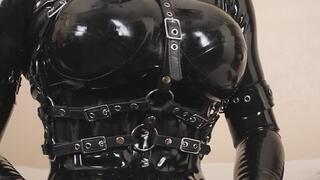 Gagged Latex Rubberdoll Teases Rubber Cock with Vibrator and Pump