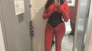 Rubberdoll Sura walking through the hotel corridors