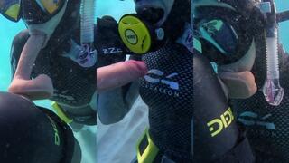 Underwater dildo blowjob at sea