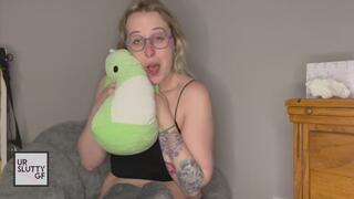 Sneezing While Showing Off Stuffed Toys