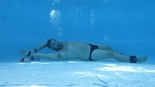 Speedo bondage wriggle