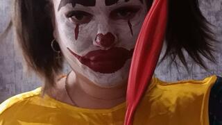 clown girl play with punchballoons