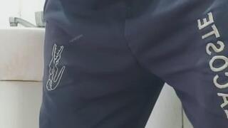 A well-endowed man urinating and showing off his big, thick penis.