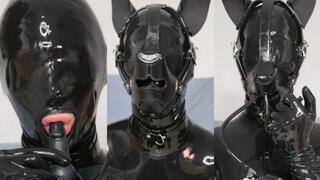 Rubber pet plays with inflatable gag and cums